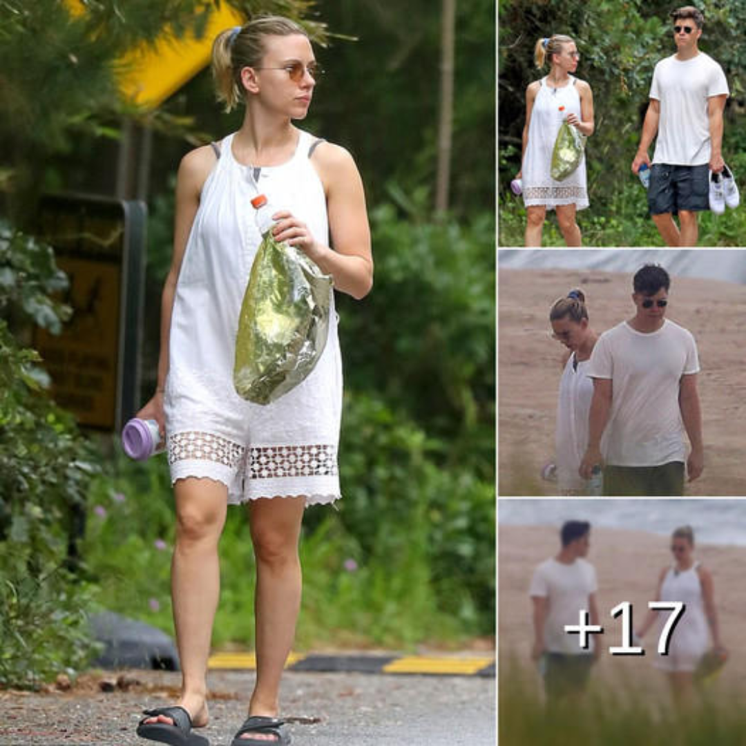 Cover Image for Scarlett Johansson dons summery white romper for beach outing with her huband Colin Jost in the Hamptons