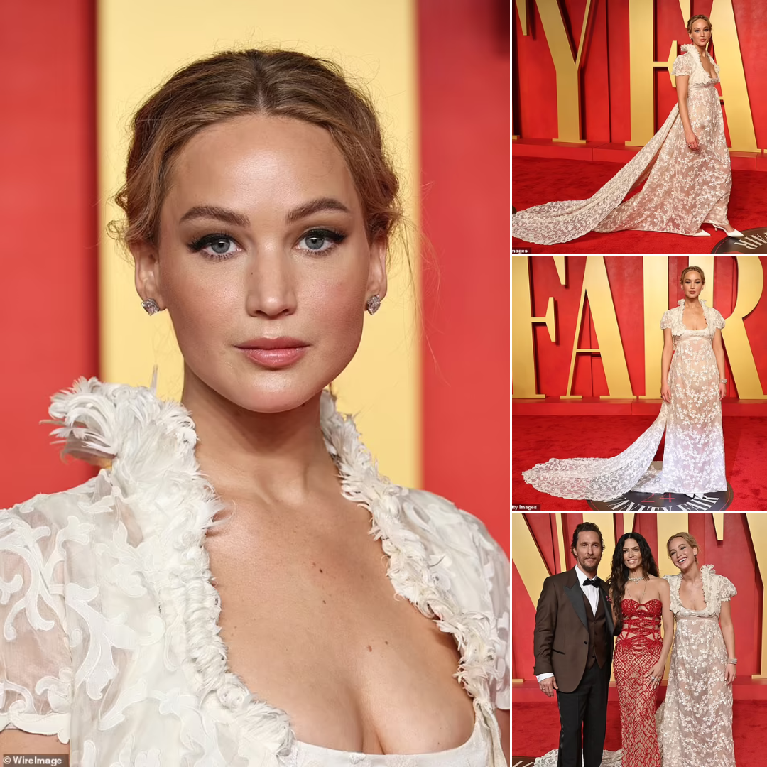 Cover Image for Jennifer Lawrence stuns in a white lace gown paired with a matching cropped jacket, complete with a dramatic cascading train, at the 2024 Vanity Fair Oscar Party.