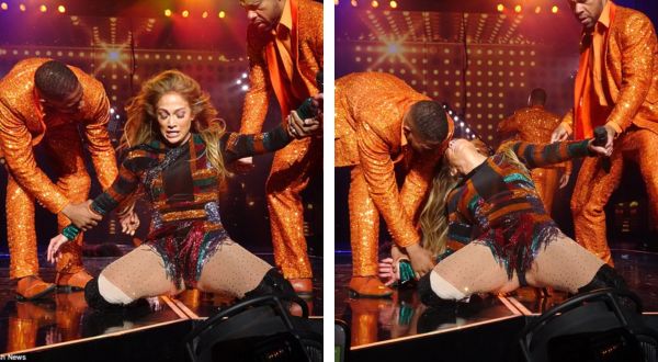 Cover Image for On the floor! Jennifer Lopez, 47, gets a hand up from her support artists subsequent to twisting excessively far during Vegas show