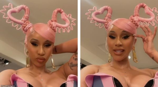 Cover Image for Cardi B debuts pink heart-molded ponytails while observing WAP’s second week at No. 1