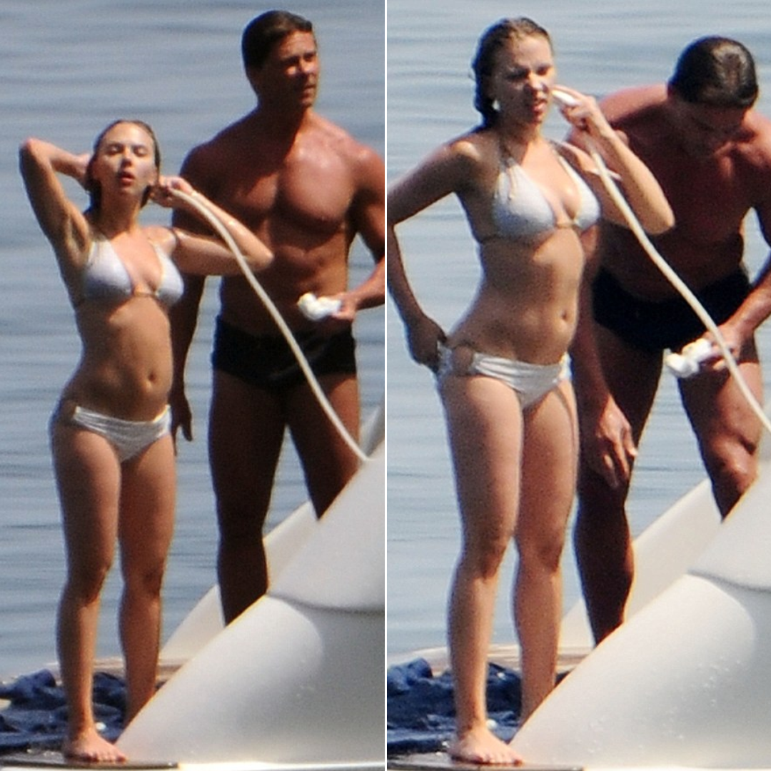 Cover Image for Watching her while she showers! Scarlett Johansson’s bodyguard is ‘on hand with the soap’ while she hoses down her bikini body